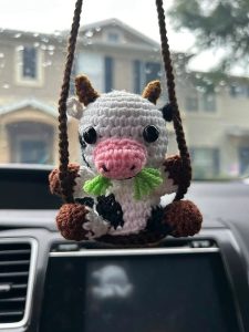 Cow sitting in a hammock crochet pattern
